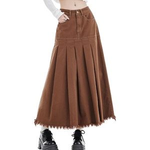 image:imagechouyatou Womens A Line Mid Rise Denim Skirt Pleated Raw Hem Flare Mid Long Jean Skirt with PocketsBrown