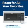 imageGE Countertop Microwave Oven Compact 07 Cubic Ft 700watt Capacity 6 Auto Cooking Settings Kitchen Essentials for the Countertop Dorm Room or Apartment Stainless SteelBlack
