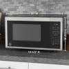 imageGE GCST09N1WWW Microwave Oven 900watt 7 Auto Cooking Settings Kitchen Essentials for The Countertop Dorm Room or Apartment ChildLock Technology 09 Cu Ft WhiteStainless Steel