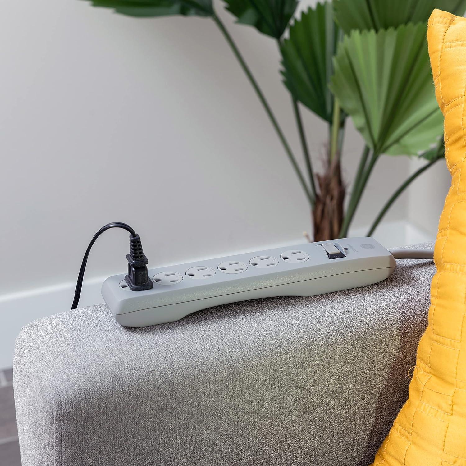 imageGE 6Outlet Surge Protector 10 Ft Extension Cord Power Strip 600 Joules TwisttoClose Safety Covers Protected Indicator Light UL Listed Black 37442Gray