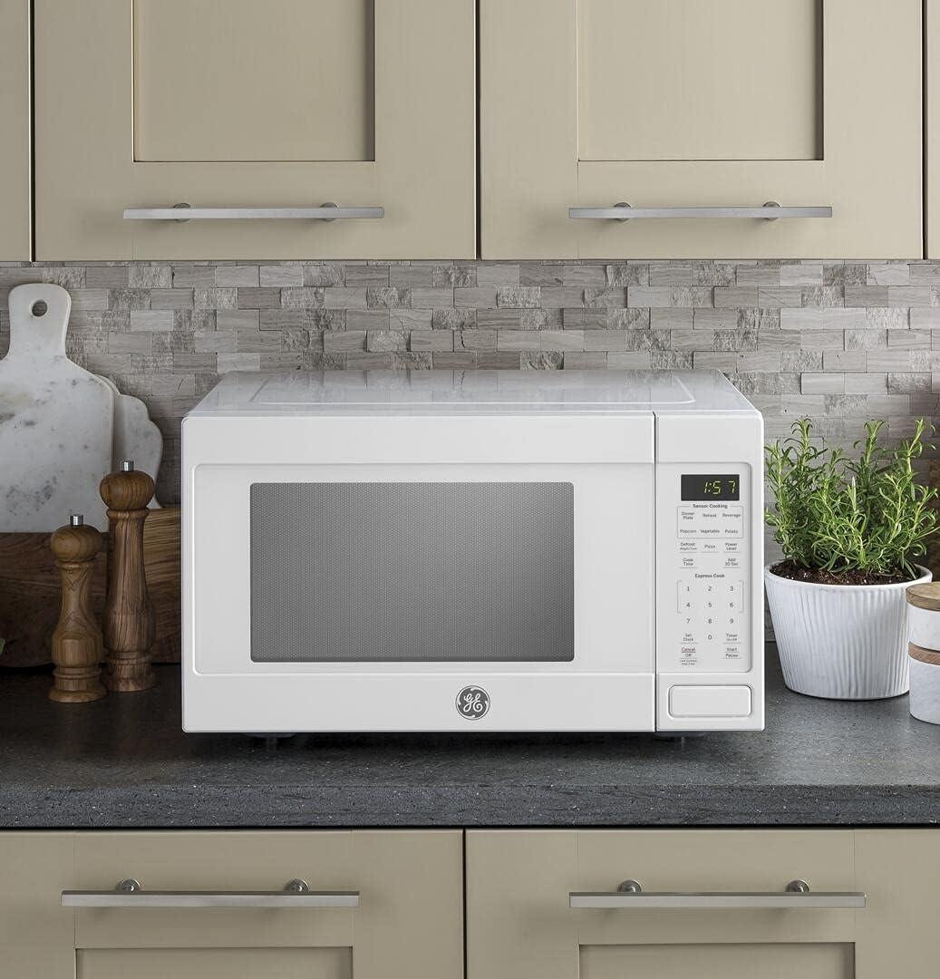 imageGE GCST16S1WWW Microwave Oven 1150watt Capacity Cubic 8 Auto Cooking Settings Kitchen Essentials for the Countertop Dorm Room or Apartment White ChildLock Technology 16 Cu FtWhite