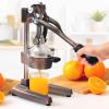 imageZulay Kitchen CastIron Orange Juice Squeezer  HeavyDuty EasytoClean Professional Citrus Juicer  Durable Stainless Steel Lemon Squeezer  Manual Citrus Press ampamp Orange Squeezer Light GreenCopper