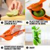 imageZulay Premium Quality Metal Lime Squeezer Citrus Juicer Manual Press for Extracting the Most Juice Possible  Lime Juicer BlackOrange