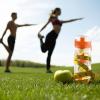 imageZulay Fruit Infuser Water Bottle  34oz  Leakproof With FullLength Infusion Rod  Men Womens Ideal Fitness Gift Or For Gym CampingSunrise Orange