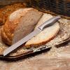 imageZulay Serrated Bread Knife  Stainless Steel Bread Knife for Homemade Bread Cake Bagel  One Piece Bread Cutter ampamp Slicer with Tip Safety Guard  Sharp 8Inch Blade ampamp 5Inch Handle BlackSilver