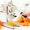 imageZulay Kitchen CastIron Orange Juice Squeezer  HeavyDuty EasytoClean Professional Citrus Juicer  Durable Stainless Steel Lemon Squeezer  Sturdy Manual Citrus Press ampamp Orange Squeezer CreamCream