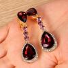 imageBriLove Womens Wedding Bridal Crystal Teardrop Infinity Figure 8 Chandelier Dangle ClipOn EarringsDeep Amethyst Color GoldTone