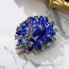 imageBriLove Women s Elegant Stunning Crystal Rhinestone Marquise Emerald Cut Leaf Knot Bouquet Brooch Pin for Party PromBlue GoldTone