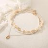 imageBriLove Bohemian Boho Handmade Simulated Pearls Natural Sea Shell Starfish Layered Collar Necklace for Women Summer Beach AccessoriesLayered Collar Clear