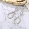 imageBriLove Gorgeous Sparkly Rhinestone Teardrop Infinity Figure 8 Shape Statement Dangle Drop Earrings for Women Wedding Bridal Party Prom Jewelry AccessoriesClear SilverTone