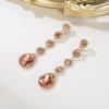 imageBriLove Clipon Earrings for WomenGorgeous Shiny Rhinestones Teardrop Chandelier Long Dangle Earring for Wedding Party Prom Jewelry AccessoriesPeach Rose GoldTone
