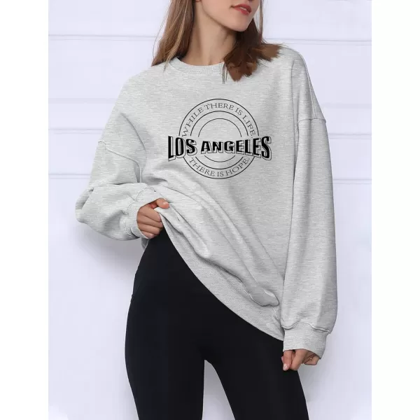Flygo Women's Oversized Letter Graphic Print Drawstring Vintage Drop Shoulder Hoodies Long Sleeve Pullover Sweatshirt