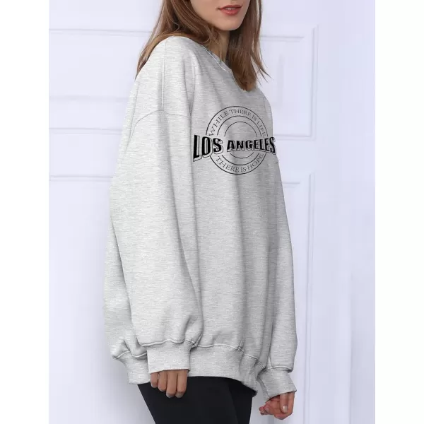 Flygo Women's Oversized Letter Graphic Print Drawstring Vintage Drop Shoulder Hoodies Long Sleeve Pullover Sweatshirt