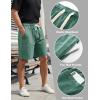 imageFlygo Mens 3 Pack Athletic Sweat Shorts Acid Washed Cotton Elastic Waist Drawstring Gym Workout Jogger Pants with PocketsBlacklightgreygreen