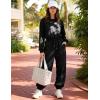 image:imageFlygo Womens Casual One Piece Jumpsuits Long Sleeve Crewneck Open Back Rompers Wide Leg Drawstring Waist Outfits with PocketsBlack