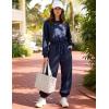 image:imageFlygo Womens Casual One Piece Jumpsuits Long Sleeve Crewneck Open Back Rompers Wide Leg Drawstring Waist Outfits with PocketsNavyblue