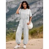 image:imageFlygo Womens One Piece Jumpsuit Casual Crewneck Wide Leg Rompers  Short Sleeve Round Neck Back Cutout Drawstring Elastic Waist Ankle Length Long Pants Travel Airport Cruise Jogger OutfitLightgrey