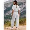 image:imageFlygo Womens One Piece Jumpsuit Casual Crewneck Wide Leg Rompers  Short Sleeve Round Neck Back Cutout Drawstring Elastic Waist Ankle Length Long Pants Travel Airport Cruise Jogger OutfitLightgrey
