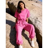 image:imageFlygo Womens One Piece Jumpsuit Casual Crewneck Wide Leg Rompers  Short Sleeve Round Neck Back Cutout Drawstring Elastic Waist Ankle Length Long Pants Travel Airport Cruise Jogger OutfitPink