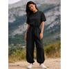 image:imageFlygo Womens One Piece Jumpsuit Casual Crewneck Wide Leg Rompers  Short Sleeve Round Neck Back Cutout Drawstring Elastic Waist Ankle Length Long Pants Travel Airport Cruise Jogger OutfitBlack