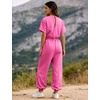 image:imageFlygo Womens One Piece Jumpsuit Casual Crewneck Wide Leg Rompers  Short Sleeve Round Neck Back Cutout Drawstring Elastic Waist Ankle Length Long Pants Travel Airport Cruise Jogger OutfitPink
