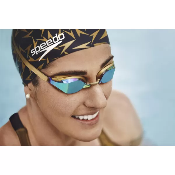 Speedo UnisexAdult Swim Cap Silicone Elastomeric  Manufacturer DiscontinuedBLACKGOLD STAR