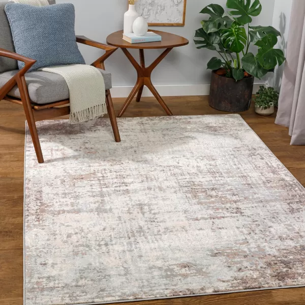 Artistic Weavers Tallie Industrial Modern Area Rug 910 x 14 Dark BlueCamel