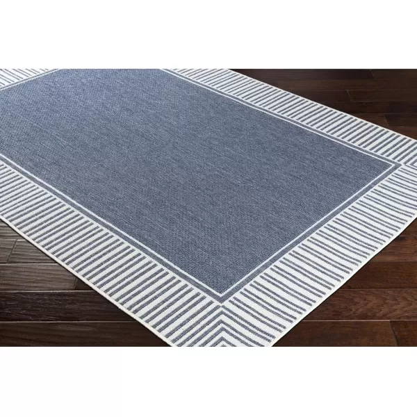 Artistic Weavers Hampshire Solid Border Outdoor Area Rug 73 Square Taupe25 x 45 Denim