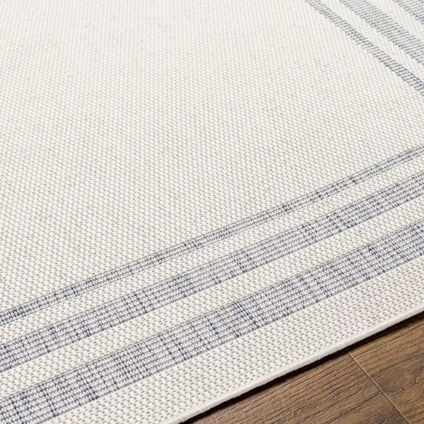 Artistic Weavers Sawyer Cottage Border Outdoor Area Rug 53 x 7 CreamBlueArtistic Weavers Sawyer Cottage Border Outdoor Area Rug 53 x 7 CreamBlue