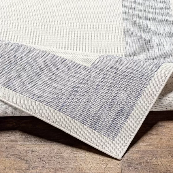 Artistic Weavers Sawyer Outdoor Border Modern Area Rug 53 x 7 CreamBlueArtistic Weavers Sawyer Outdoor Border Modern Area Rug 53 x 7 CreamBlue