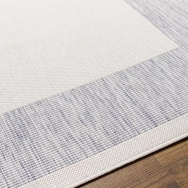 Artistic Weavers Sawyer Outdoor Border Modern Area Rug 53 x 7 CreamBlueArtistic Weavers Sawyer Outdoor Border Modern Area Rug 53 x 7 CreamBlue