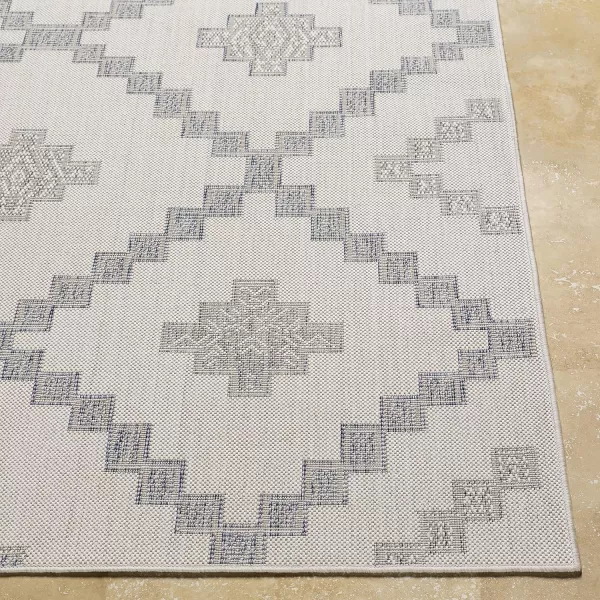 Artistic Weavers Sawyer Rustic Tribal Diamond Outdoor Area Rug 53 x 7 CreamBlueArtistic Weavers Sawyer Rustic Tribal Diamond Outdoor Area Rug 53 x 7 CreamBlue