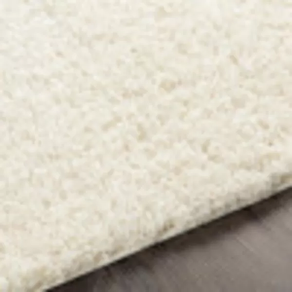 Artistic Weavers Solid Plush Blissful Shag Area Rug 710 x 10 Cream43 x 57 Cream