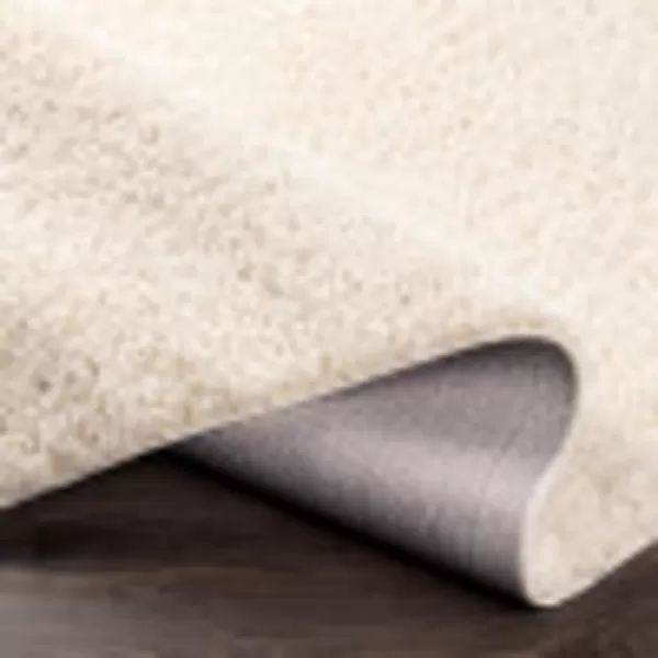 Artistic Weavers Solid Plush Blissful Shag Area Rug 710 x 10 Cream43 x 57 Cream