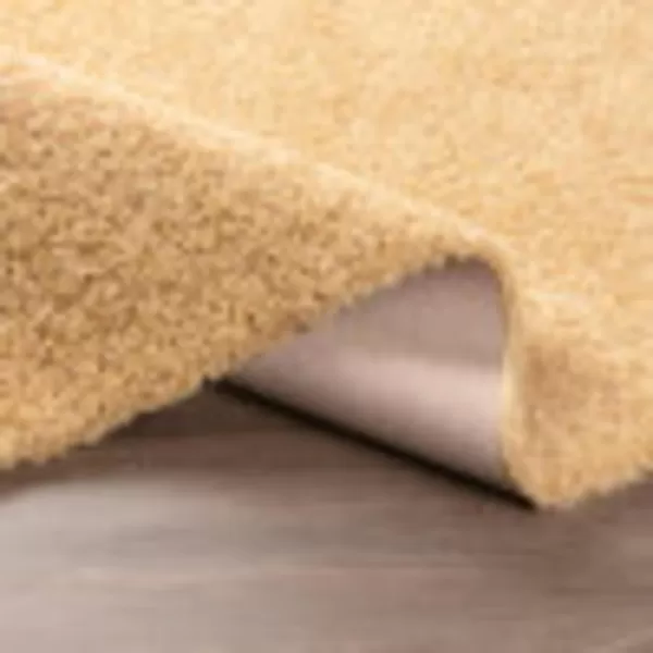 Artistic Weavers Solid Plush Blissful Shag Area Rug 710 x 10 Cream53 x 7 Wheat