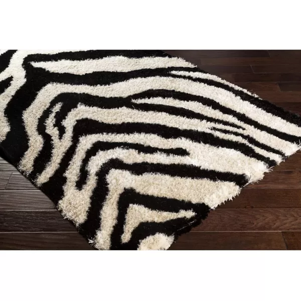 Artistic Weavers Zebra Print Alarik Shag Area Rug 5 ft x 7 ft 6 in BlackCream5 ft x 7 ft 6 in BlackCream