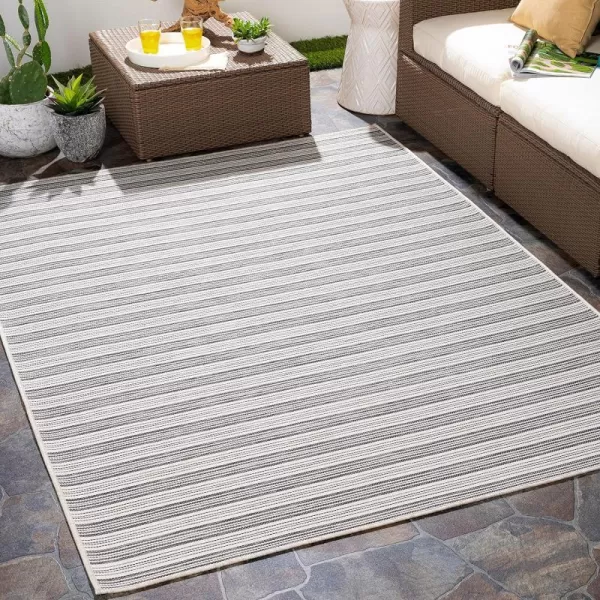 Artistic Weavers Decker Striped Outdoor Area Rug 53 x 73 Medium GrayArtistic Weavers Decker Striped Outdoor Area Rug 53 x 73 Medium Gray