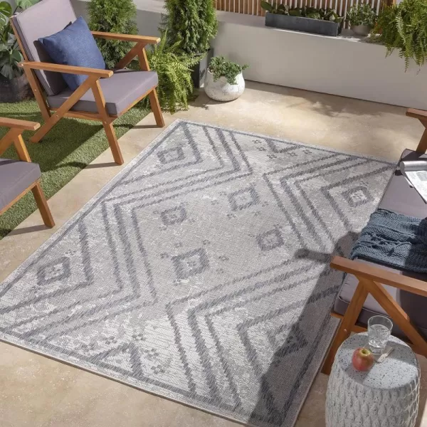 Artistic Weavers Sawyer Global Diamond Chevron Outdoor Area Rug 53 x 7 TaupeBlueArtistic Weavers Sawyer Global Diamond Chevron Outdoor Area Rug 53 x 7 TaupeBlue