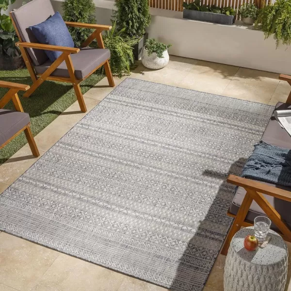 Artistic Weavers Sawyer Global Rustic Stripe Outdoor Area Rug 53 x 7 NavyArtistic Weavers Sawyer Global Rustic Stripe Outdoor Area Rug 53 x 7 Navy