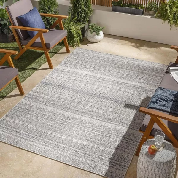 Artistic Weavers Sawyer Moroccan Stripe Outdoor Area Rug 53 x 7 CreamLight BlueArtistic Weavers Sawyer Moroccan Stripe Outdoor Area Rug 53 x 7 CreamLight Blue