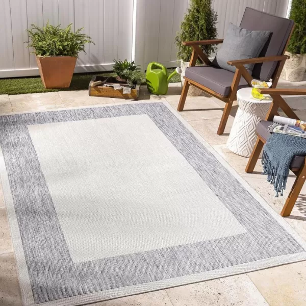 Artistic Weavers Sawyer Outdoor Border Modern Area Rug 53 x 7 CreamBlueArtistic Weavers Sawyer Outdoor Border Modern Area Rug 53 x 7 CreamBlue