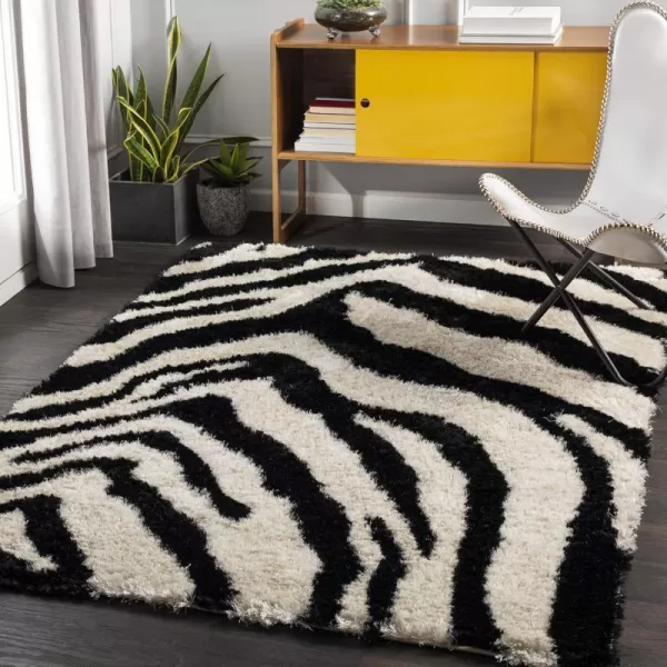 Artistic Weavers Zebra Print Alarik Shag Area Rug 5 ft x 7 ft 6 in BlackCream5 ft x 7 ft 6 in BlackCream