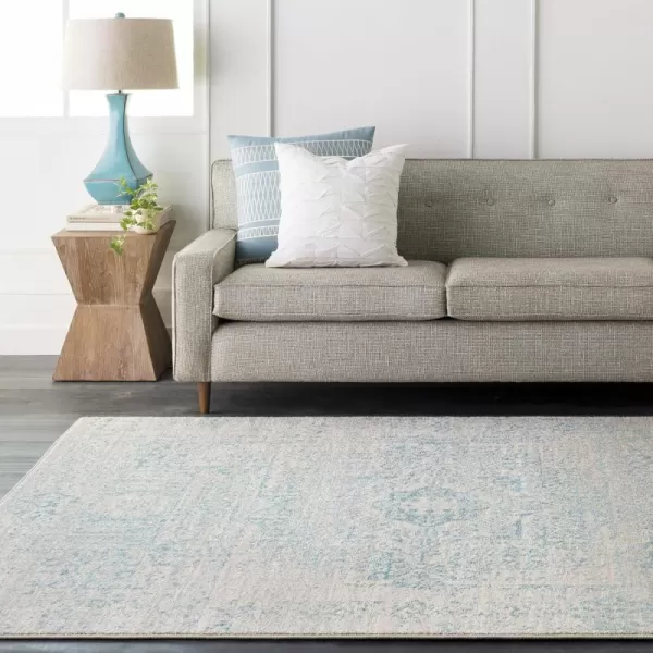 Valeria Dark Blue Light Gray and Beige Updated Traditional Area Rug 710 x 103710 x 103 Light Teal