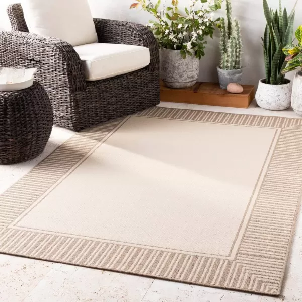 imageLivabliss Hampshire Solid Border Outdoor Area Rug 53quot x 77quot BlackBrown