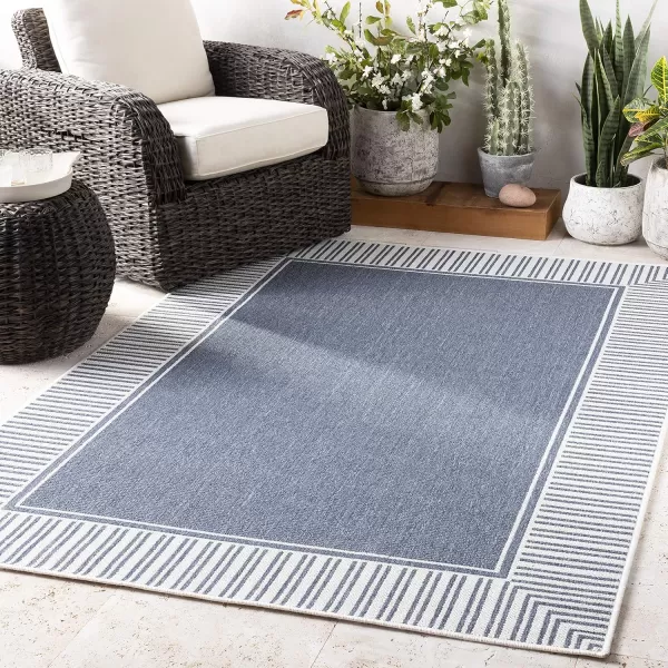 imageLivabliss Hampshire Solid Border Outdoor Area Rug 53quot x 77quot BlackCharcoal