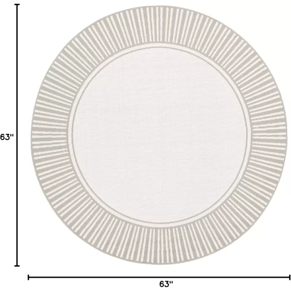 imageLivabliss Hampshire Solid Border Outdoor Area Rug 53quot x 77quot BlackTaupeWhite