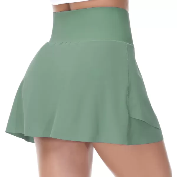 imageTHE GYM PEOPLE Womens Cross Waist Tennis Skirts with Cutting Hem Golf Skorts with Inner Mesh Pockets ShortsJasmine Green