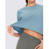 imageTHE GYM PEOPLE Workout Crop Tops for Women Short Sleeve Shirts Loose Fit Yoga Athletic Basic Cropped TShirtsInk Blue