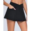 imageTHE GYM PEOPLE Womens Cross Waist Jean Skorts Stretchy Ruffle Denim Skirts with 2 in 1 Shorts PocketsBlack