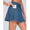 imageTHE GYM PEOPLE Womens Cross Waist Jean Skorts Stretchy Ruffle Denim Skirts with 2 in 1 Shorts PocketsDenim Blue